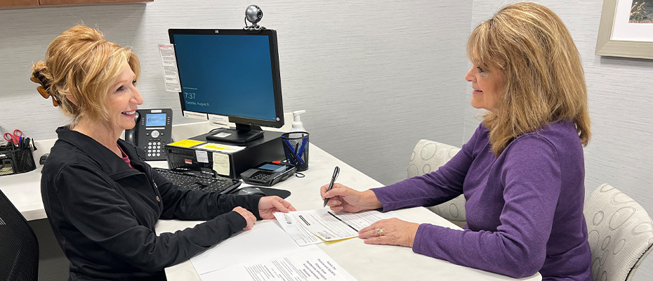 Woman filling out paperwork